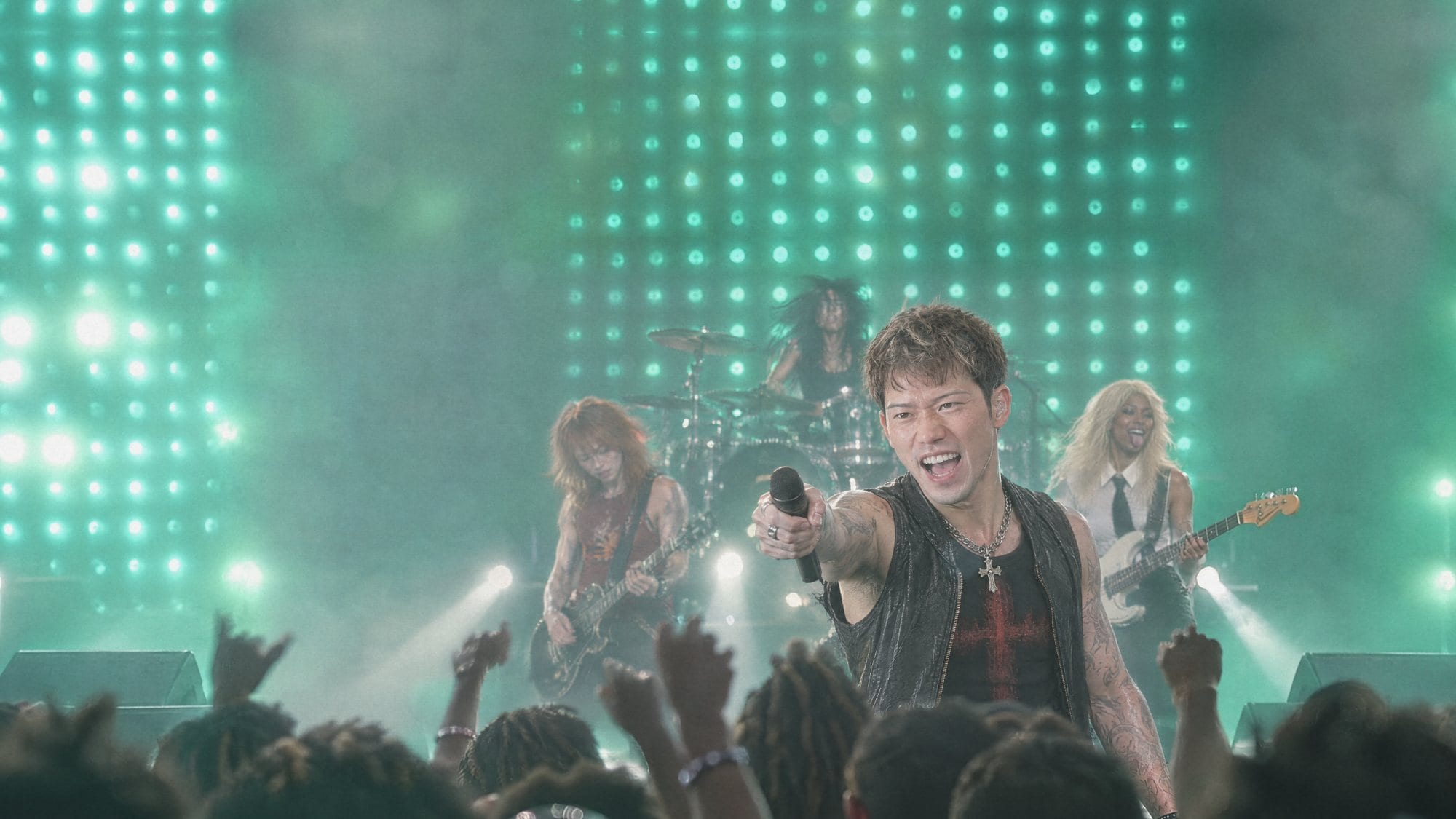 AANOTHER frontman on stage, an AI band made by Nataka Inc